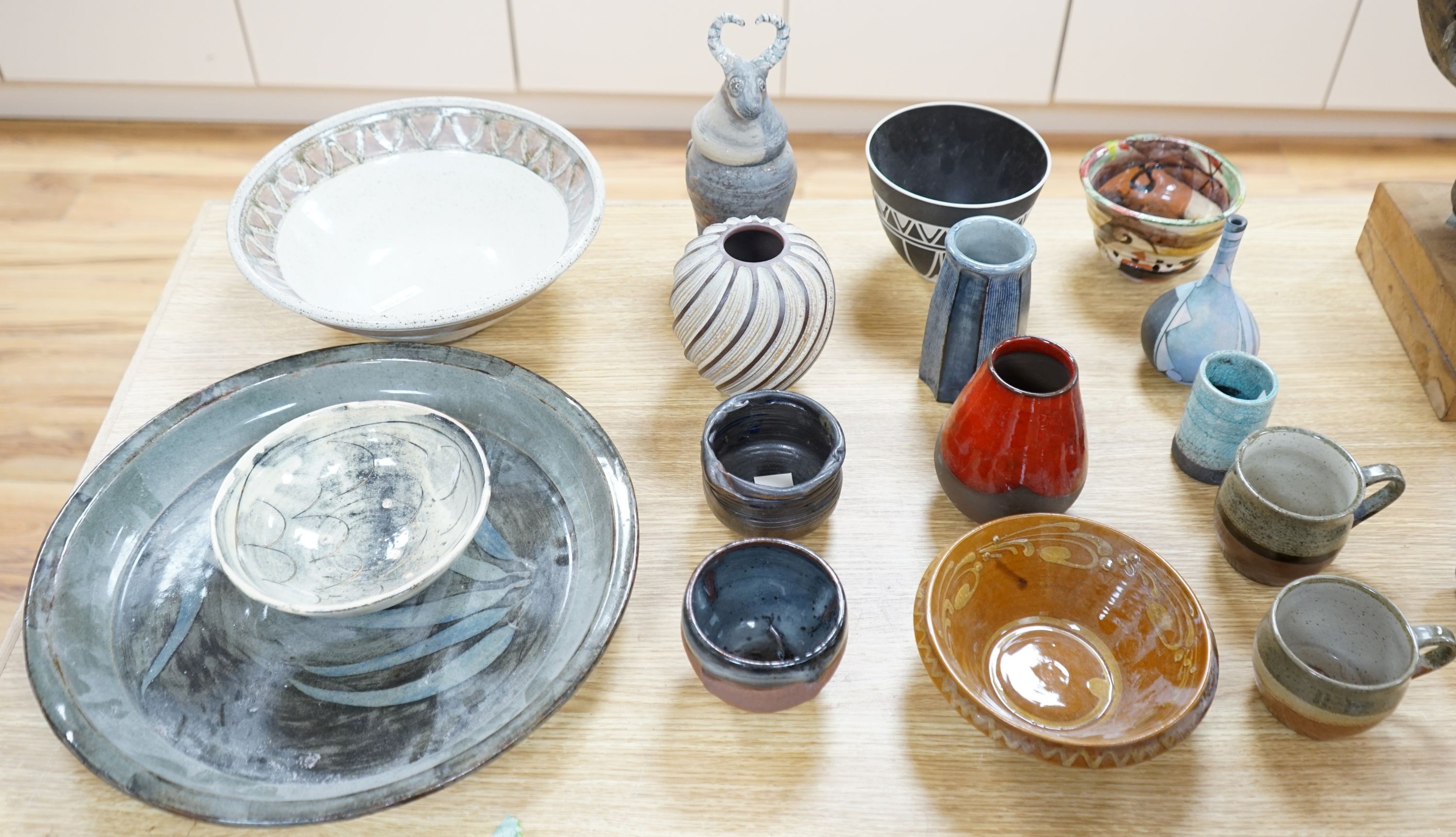 A group of studio pottery dishes, bowls and vases to include- 38cm